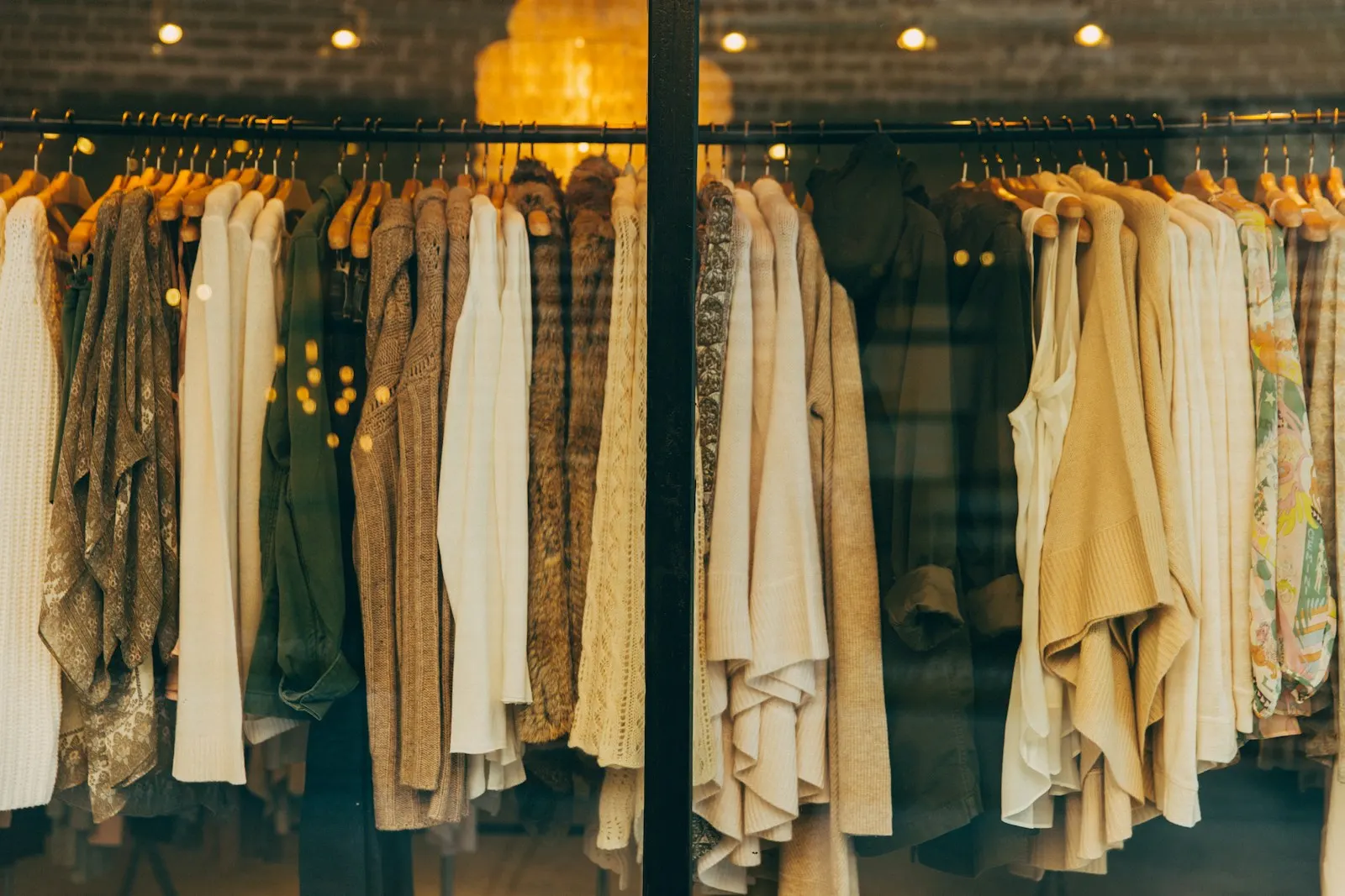 Ready-made garments hanging on a rack in a clothing store