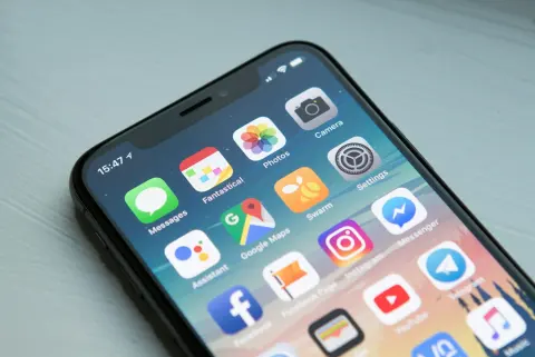Phone showing chat messages