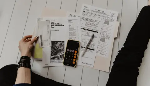 Tax documents and a calculator